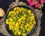 A picture of step 5 of Jeera Aloo (Cumin Potatoes).
