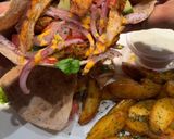 A picture of step 5 of Chicken Shawarma Pita Pockets.