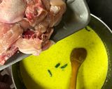 A picture of step 4 of Ayam Masak Lemak Cili Api (Spicy Chicken in Coconut Milk).