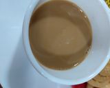 A picture of step 2 of Ginger and cardamom tea.