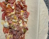 Foto del paso 7 de la receta: Calzone relleno (jamón, queso, tomate, huevo y aceitunas) 👏🏻