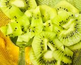A picture of step 1 of Refreshing orange kiwi mocktail.