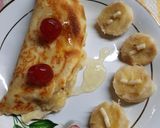 Foto del paso 5 de la receta: Panqueque tibio relleno con banana