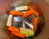 A picture of step 1 of Chicken Broth in Instant Pot.