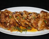 A picture of step 4 of Roasted chicken thighs with fresh rosemary.