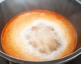 Foto del paso 6 de la receta: "Socarrat" de conservas, calamares, berberechos y bacalao 🔥🔥🔥