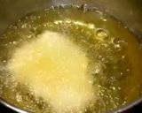 A picture of step 7 of Bhatura - puffed fried bread.