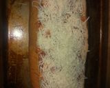A picture of step 4 of Pizza baked stuffed French bread.