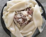 Foto del paso 1 de la receta: Calamares en salsa de ajo