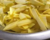 A picture of step 1 of Sun dried mango pickle / Magaya.