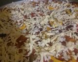 صورة لخطوة 5 من وصفة بيتزا 🍕 بعجينه العشر دقايق