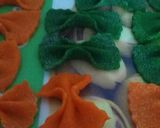 A picture of step 20 of Homemade farfalle pasta in three colour.