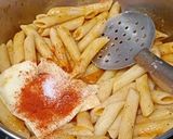 A picture of step 3 of Penne in red sauce with herbs.