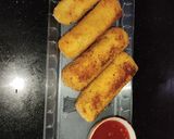 A picture of step 8 of Cheesy Kabab Bread Roll.