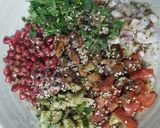 A picture of step 4 of Healthy Makhaana Salad with fruits veggies and nuts.