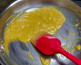 A picture of step 1 of Quick Moong dal Atta Halwa.