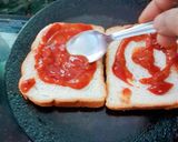 A picture of step 2 of Cheese bread pizza 🍕.
