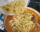 A picture of step 6 of Seafood Rose` penne pasta.