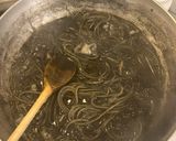 A picture of step 4 of One-Pan Spaghetti with Squid Ink and Lemon.