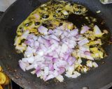 A picture of step 6 of Egg tawa masala.