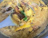 Gambar langkah 9 resipi Sotong Sumbat Masak Lemak Kuning.