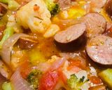 A picture of step 4 of Red Onion with Chicken Smoked Sausage.