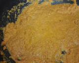 A picture of step 2 of Instant Moong Dal Halwa.