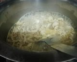 A picture of step 2 of Easy Pea-sy Masala Maggi.