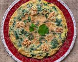 Foto del paso 4 de la receta: Tortilla de berro, ajo y nueces 🌱 🥚