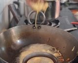 A picture of step 2 of Fulori Kadhi (UP style Pakoda Kadhi).