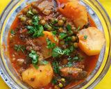 A picture of step 3 of Peas Potato and Brinjal Curry.