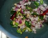 A picture of step 3 of Coriander and tomato rice.