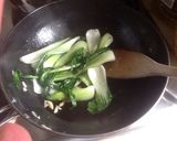 A picture of step 4 of Pac Choi with garlic.