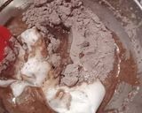 A picture of step 6 of Center filled chocolate cup cakes😋.