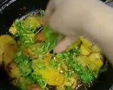 A picture of step 4 of Masala potatoes slices.
