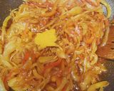 A picture of step 2 of King prawns & pointed peppers biryani.