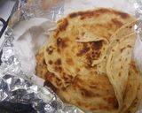 A picture of step 9 of White chapati (oiled thrice and rolled out twice).