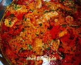 A picture of step 8 of Banga stew/ofe akwu with boiled rice my way.