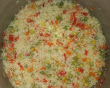 Foto del paso 13 de la receta: Arrollado de pollo, hervido con arroz primavera