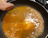 A picture of step 6 of Greek braised pork with beer, mustard and orange sauce.