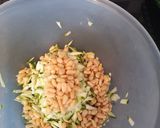 A picture of step 1 of Spaghetti with prawn, tomatoes and courgette pesto.