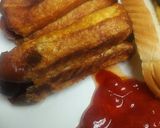 A picture of step 7 of Shallow Fried Breaded Hotdog.