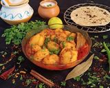A picture of step 6 of Stuffed Potato Curry (garam masala).