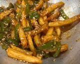 A picture of step 2 of Crispy honey chilli potato.