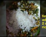 A picture of step 6 of Fried rice with spinach and pineapple.