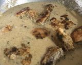 A picture of step 7 of Dahi wala Kukkad Chicken in yoghurt curry base.