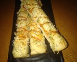 Foto langkah ke 6 dari resep Cheesy Oregano Breadstick.