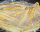 A picture of step 4 of Chessy pizza fries.