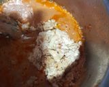 A picture of step 6 of Gajar ka halwa with peels.