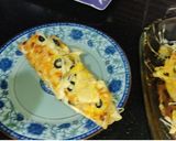 A picture of step 11 of Cheesy Mexican Chicken Fajita Wraps.